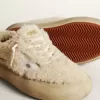 Space-Star damesschoenen in beige schapenvacht met witte leren ster en metallic leren hielstuk