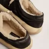 Space-Star damesschoenen van gewatteerd zwart nylon met schapenvachtvoering