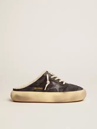Space-Star Sabot herenschoenen van gewatteerd zwart nylon met schapenvachtvoering