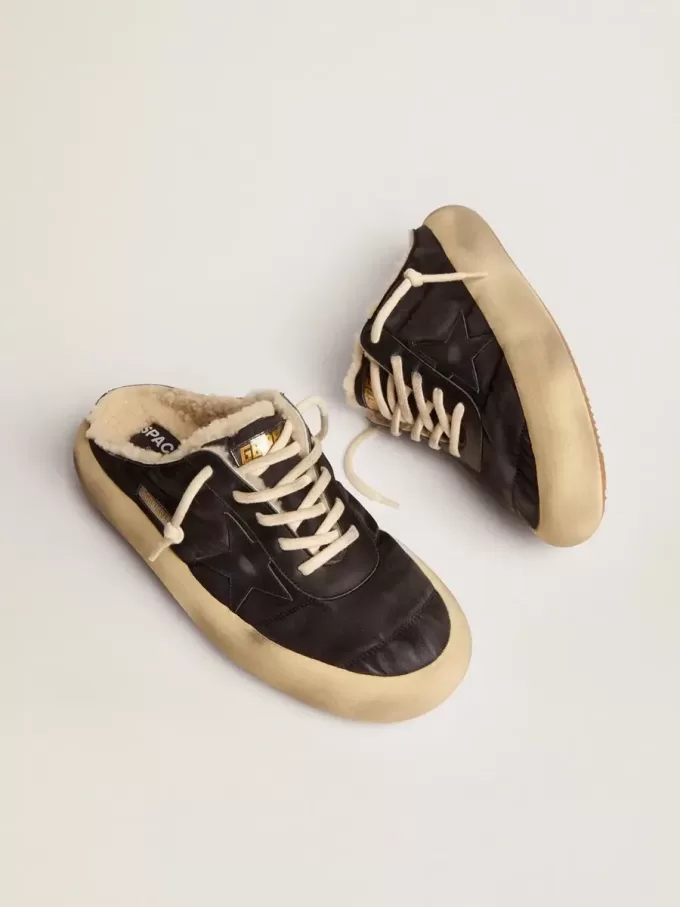 Space-Star Sabot herenschoenen van gewatteerd zwart nylon met schapenvachtvoering