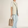 Stardan met beige suède ster en neus en all-over letters en patronen