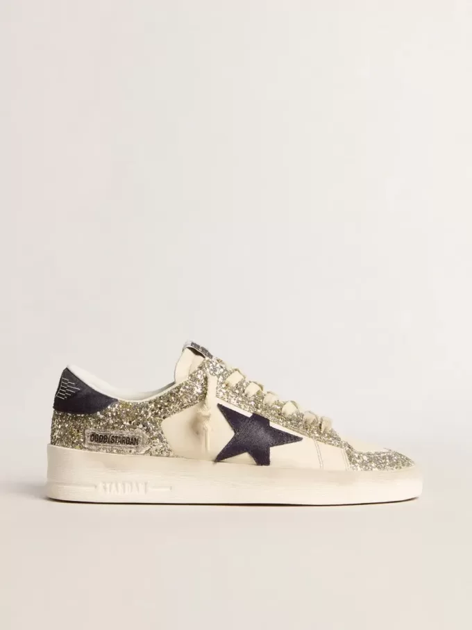 Stardan voor dames in platina glitter met donkerblauwe suède ster en hielbandje