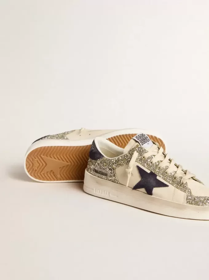 Stardan voor dames in platina glitter met donkerblauwe suède ster en hielbandje