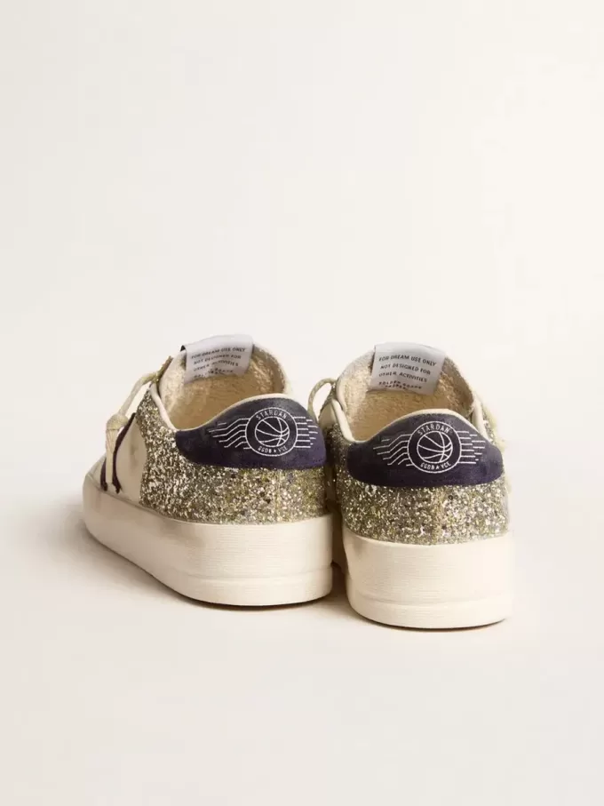 Stardan voor dames in platina glitter met donkerblauwe suède ster en hielbandje