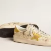 Stardan voor heren in beige leer met honingkleurige nubuck ster en hielstuk