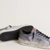 Stardan voor heren in poederblauw suède met groene leren ster en hielstuk