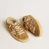 Super-Star in beige suède en schapenvacht met metallic leren ster