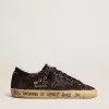 Super-Star in bruine glitter met zwarte leren ster en hielbandje
