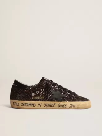 Super-Star in bruine glitter met zwarte leren ster en hielbandje