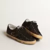 Super-Star in bruine glitter met zwarte leren ster en hielbandje