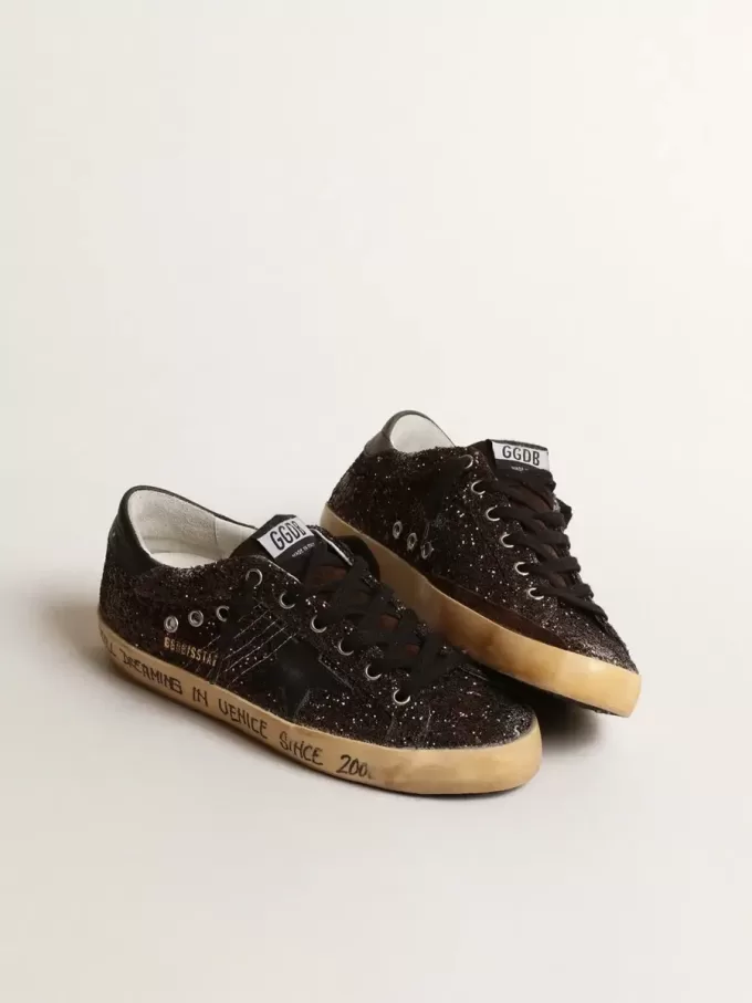 Super-Star in bruine glitter met zwarte leren ster en hielbandje