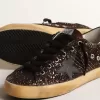 Super-Star in bruine glitter met zwarte leren ster en hielbandje