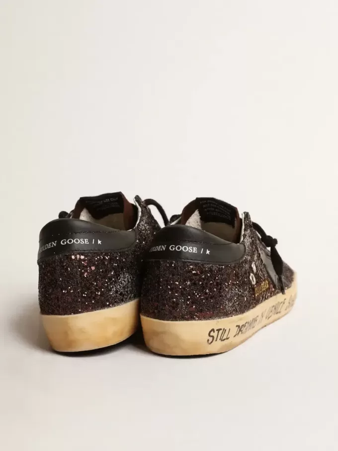 Super-Star in bruine glitter met zwarte leren ster en hielbandje