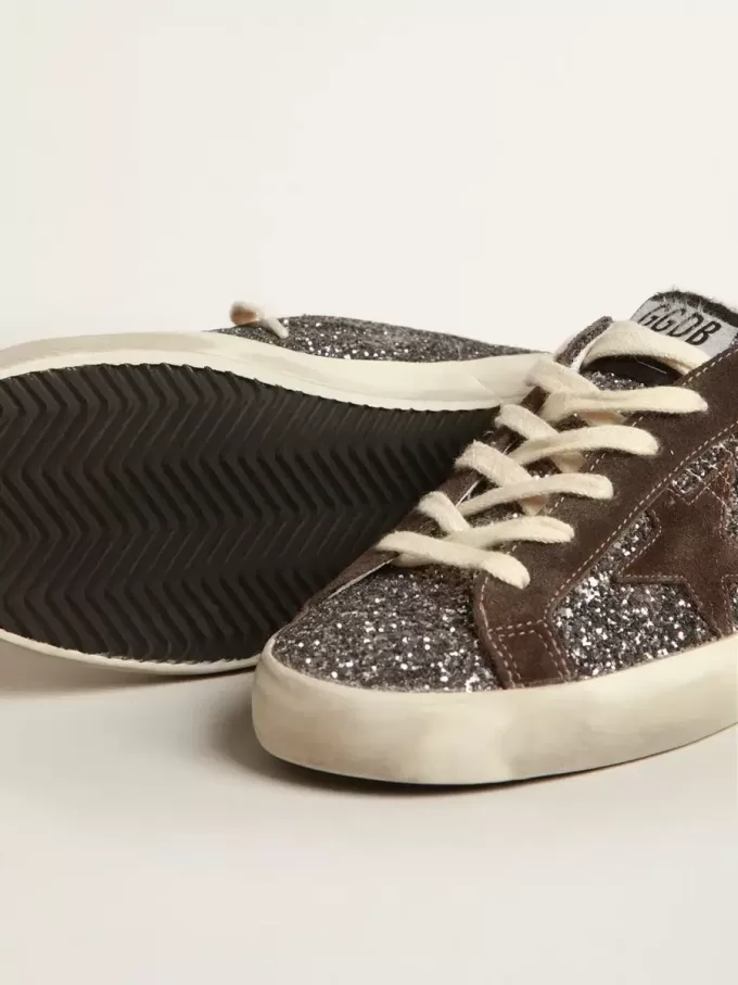 Super-Star in glitter met een bruine ster en lila hielbandje