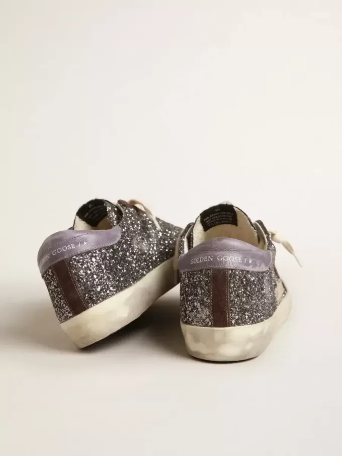 Super-Star in glitter met een bruine ster en lila hielbandje