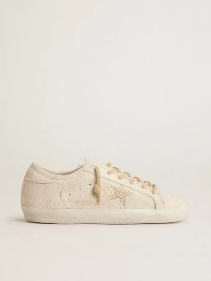 Super-Star in parelkleurig canvas met een ton-sur-ton mesh-effect ster
