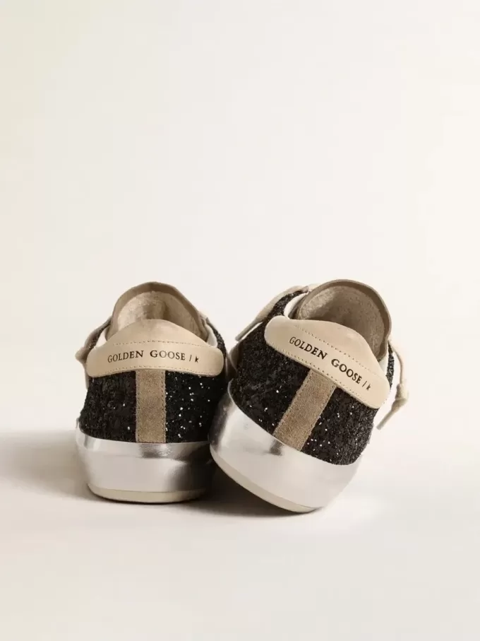 Super-Star in zwart glitter met crèmekleurige ster en suède inzetstukken