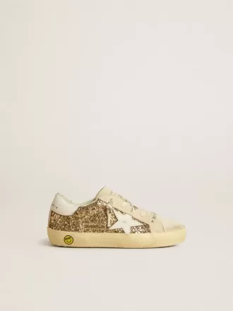 Super-Star Junior in goudglitter met witte leren ster en hielstuk