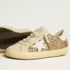 Super-Star Junior in goudglitter met witte leren ster en hielstuk