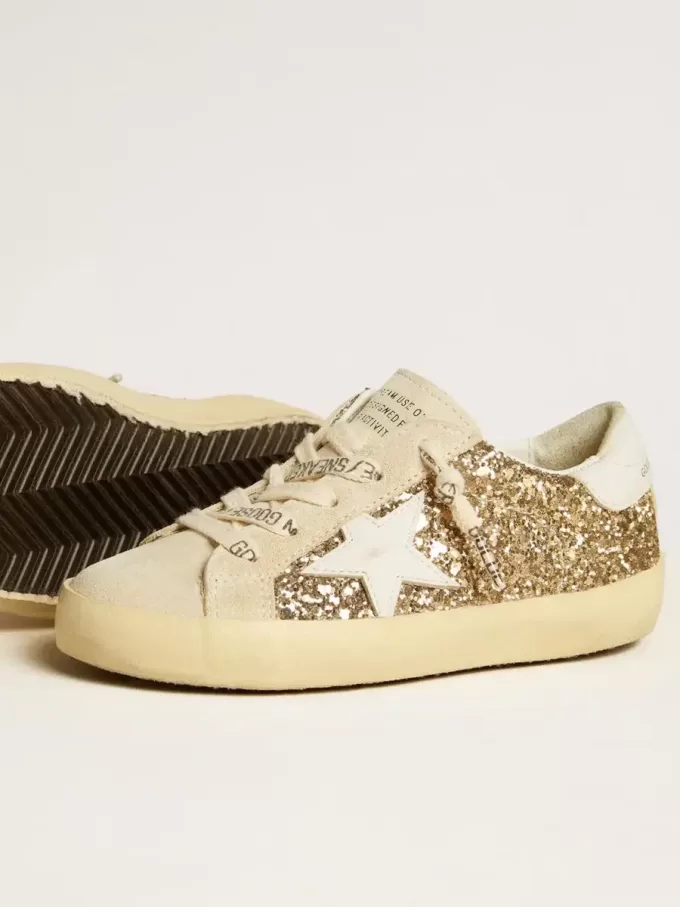 Super-Star Junior in goudglitter met witte leren ster en hielstuk