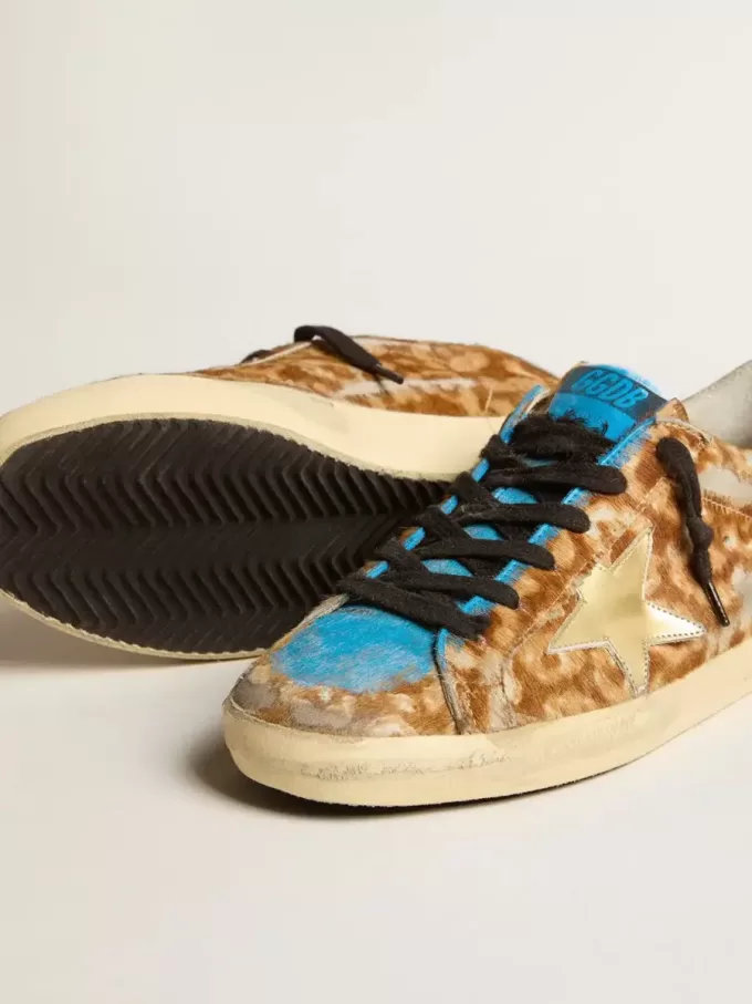 Super-Star LAB voor heren van luipaardprint ponyhuid met gouden ster en grijze hiellip.