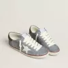 Super-Star LTD in lichtblauw nubuckleer met witte leren ster en bruine leren hielband.