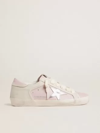 Super-Star LTD in roze leer met zilverkleurige leren ster en roze leren hielbandje.