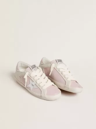 Super-Star LTD in roze leer met zilverkleurige leren ster en roze leren hielbandje.