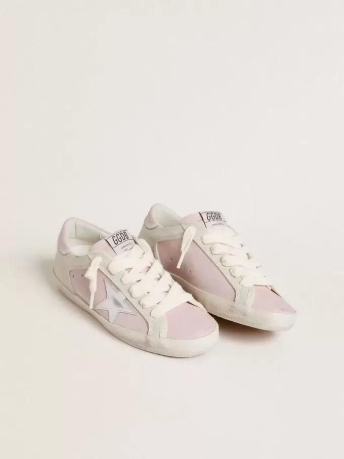 Super-Star LTD in roze leer met zilverkleurige leren ster en roze leren hielbandje.