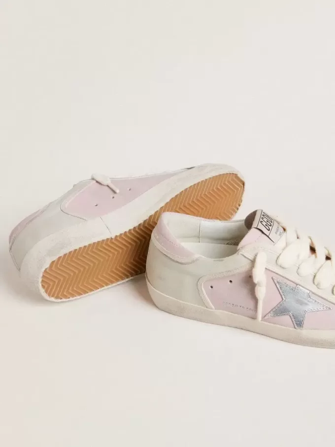 Super-Star LTD in roze leer met zilverkleurige leren ster en roze leren hielbandje.