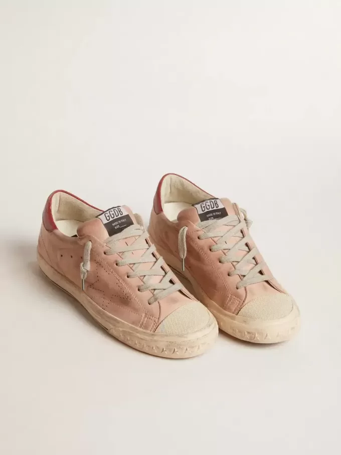 Super-Star LTD in roze nubuck met geperforeerde ster en leren hielstuk