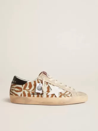 Super-Star LTD in zebra-effect Swarovski met een witte leren ster