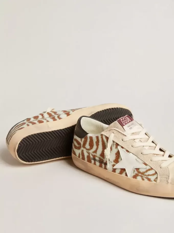 Super-Star LTD in zebra-effect Swarovski met een witte leren ster