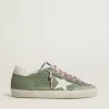 Super-Star LTD voor dames in groen nubuck met witte leren ster en hielstuk.