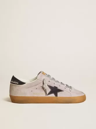 Super-Star LTD voor dames in lila suède met middernachtblauwe suède ster en hielband.