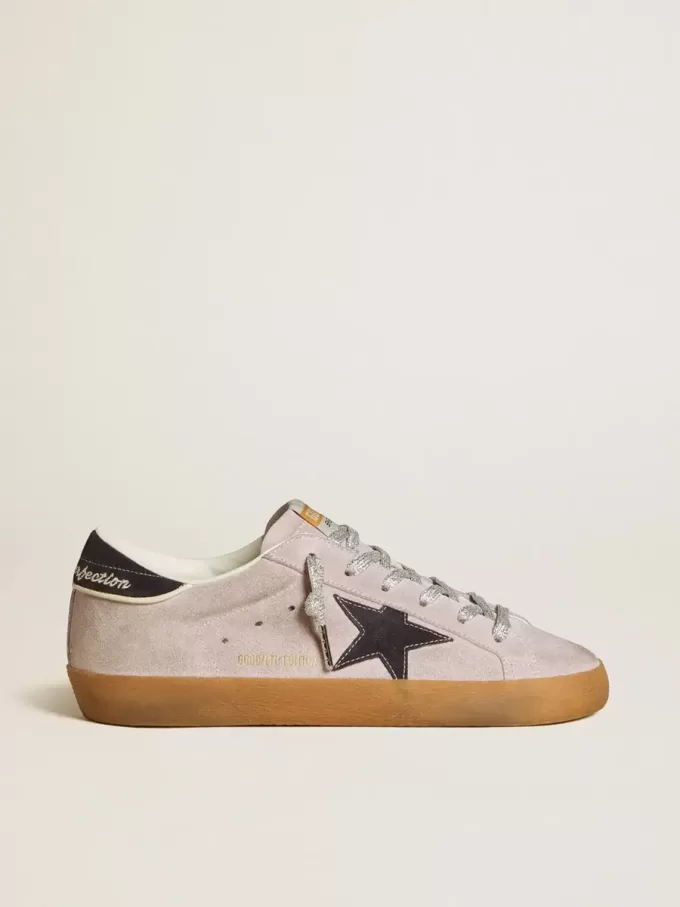 Super-Star LTD voor dames in lila suède met middernachtblauwe suède ster en hielband.