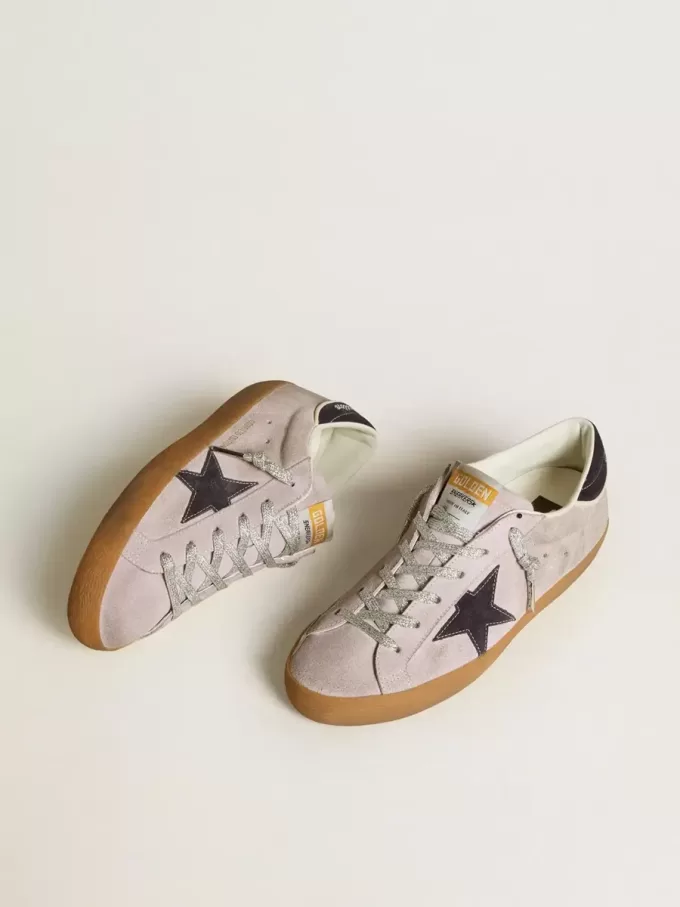 Super-Star LTD voor dames in lila suède met middernachtblauwe suède ster en hielband.