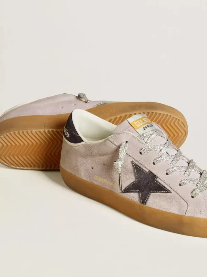 Super-Star LTD voor dames in lila suède met middernachtblauwe suède ster en hielband.