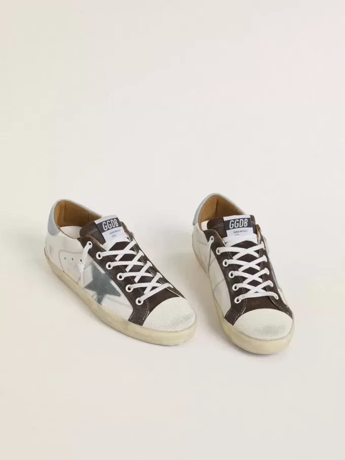 Super-Star LTD voor dames met lichtblauwe suède ster en lichtblauwe canvas hielband.