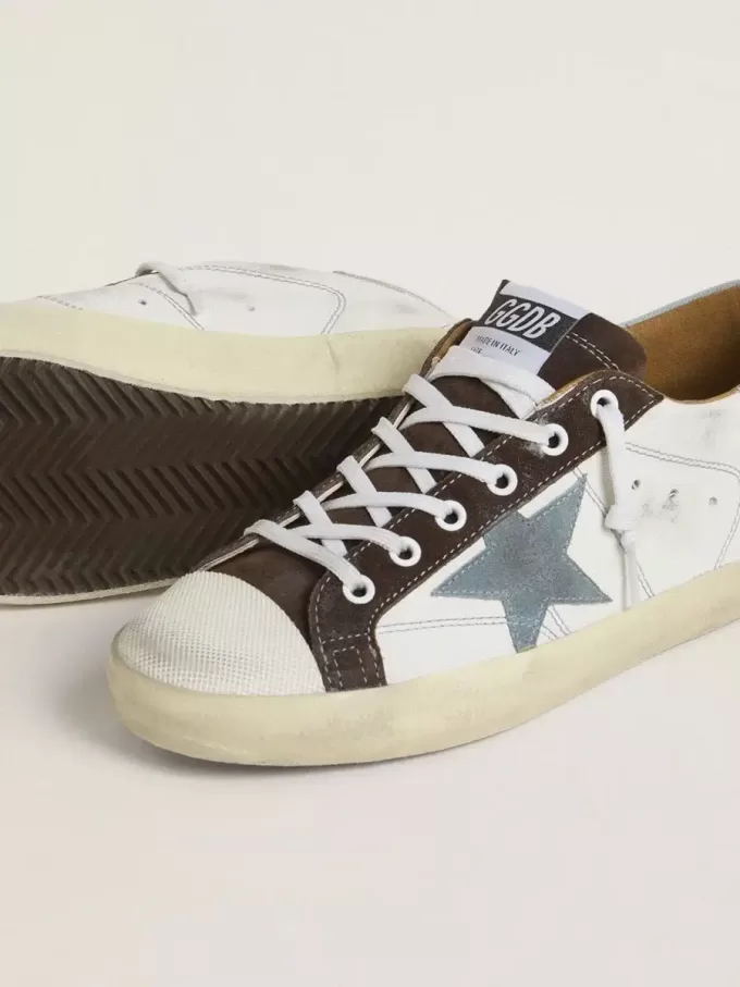 Super-Star LTD voor dames met lichtblauwe suède ster en lichtblauwe canvas hielband.
