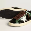 Super-Star LTD voor heren in zwart gelamineerd leer met witte leren ster en hielstuk.