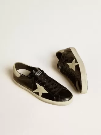 Super-Star LTD voor heren in zwart lakleer met suède ster en hielstuk