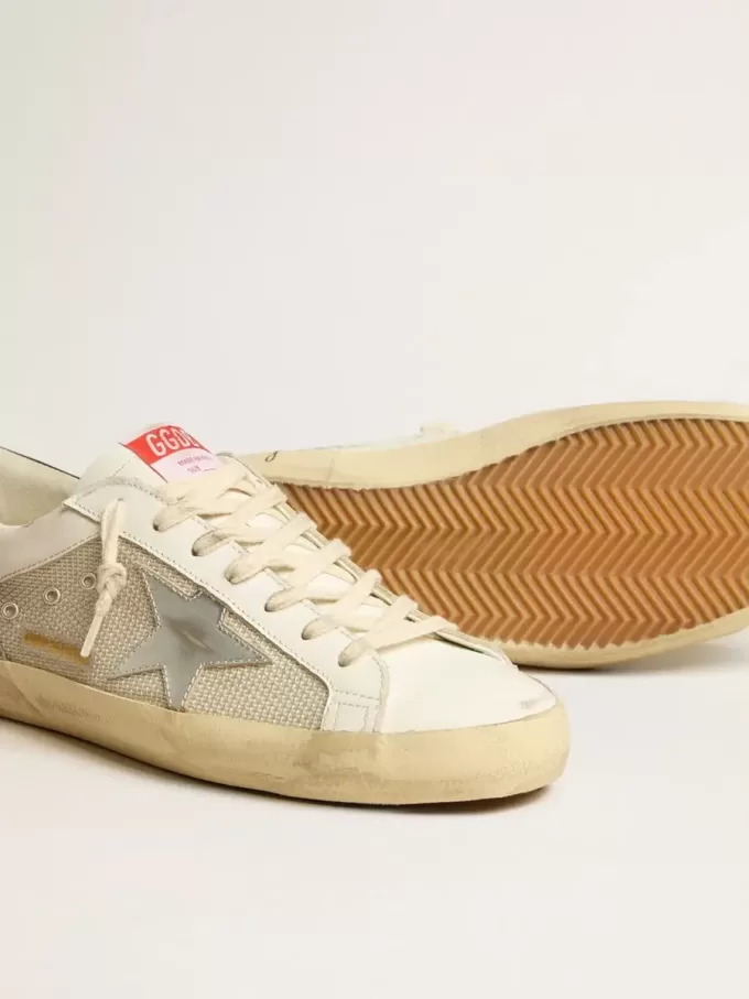 Super-Star LTD voor heren van mesh en leer met zilveren ster en blauwe hiellip.