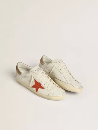 Super-Star LTD voor heren van nappaleer met oranje leren ster en tabakskleurig suède hielstuk.