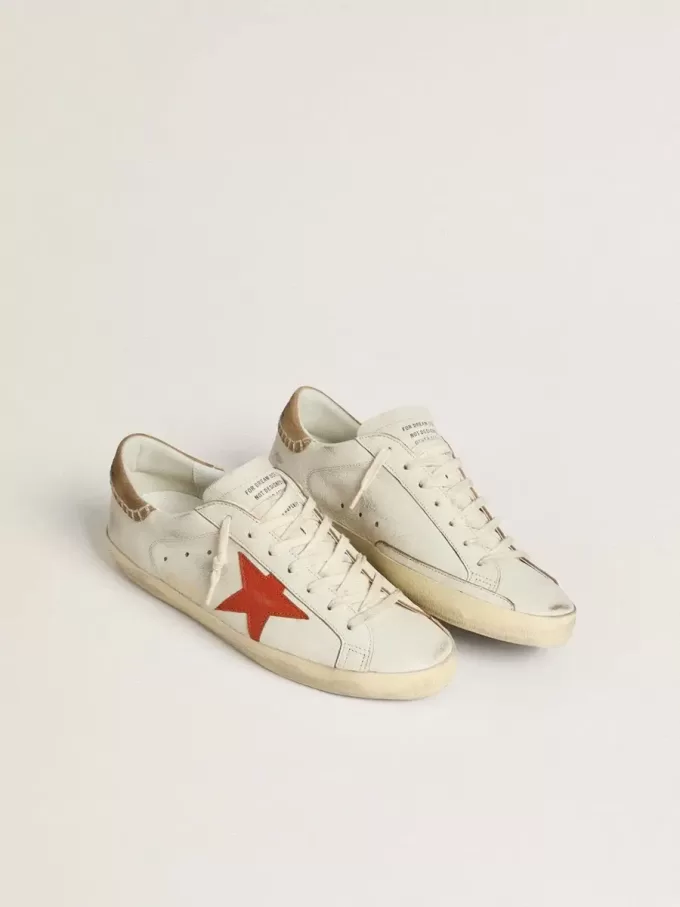 Super-Star LTD voor heren van nappaleer met oranje leren ster en tabakskleurig suède hielstuk.