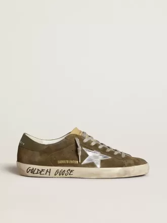 Super-Star LTD voor heren van suède met metallic leren ster en leren hielstuk.