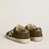 Super-Star LTD voor heren van suède met metallic leren ster en leren hielstuk.