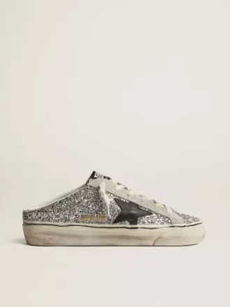Super-Star Sabot voor dames in zilver glitter met zwarte leren ster