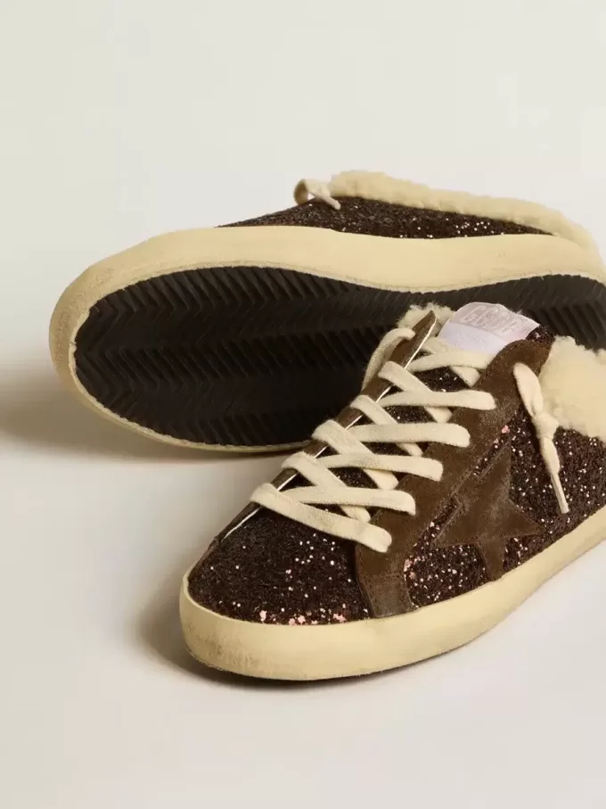 Super-Star Sabots in glitter met bruine ster en schapenvachtvoering