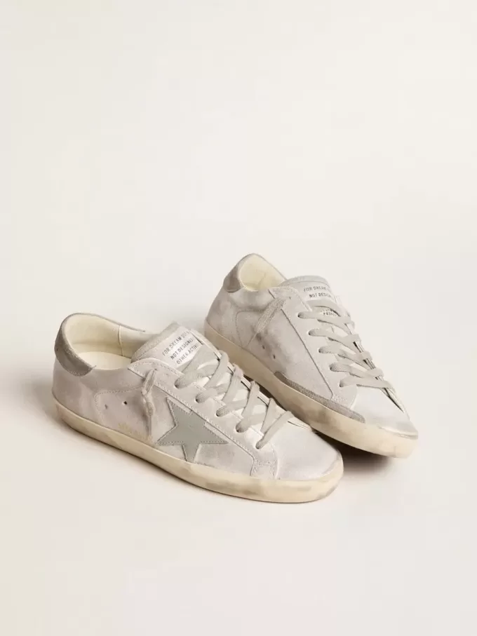 Super-Star sneakers van grijs-wit leer met glittereffect en leren ster